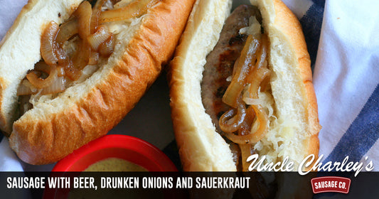 PORK SAUSAGE WITH BEER, DRUNKEN ONIONS, AND SAUERKRAUT