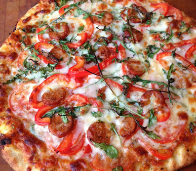 SWEET ITALIAN SAUSAGE, ROASTED PEPPER, ARUGULA, ONION & PARMESAN PIZZA